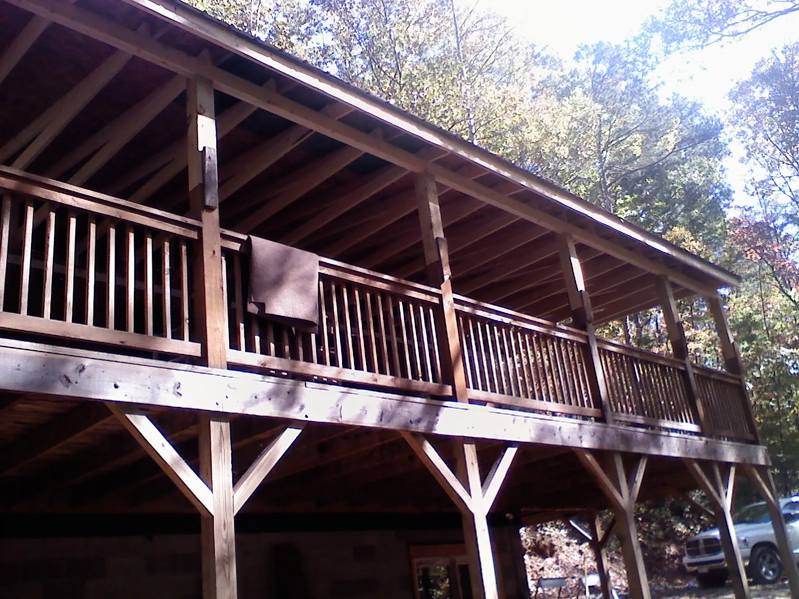 Timber framing under a new elevated porch and deck — Roof Leak Repair in Raymondville by Roofing Brothers